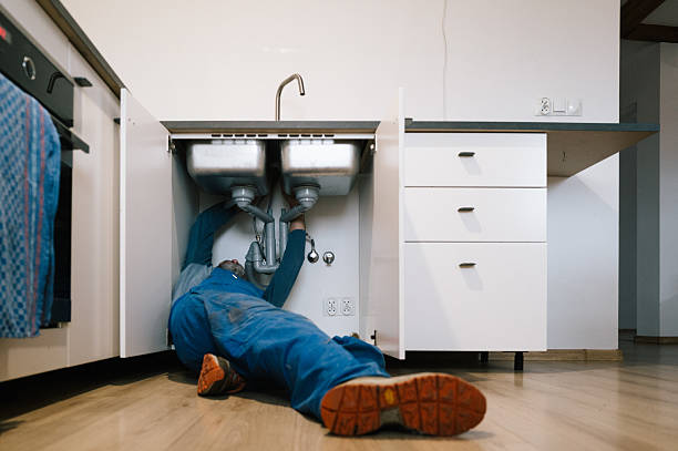 Professional Plumbing technician working in Rockfield, IN